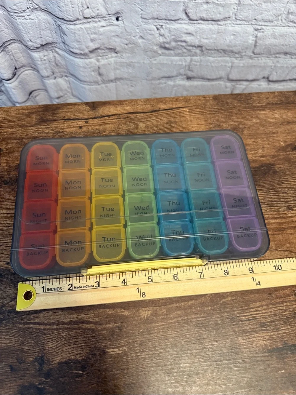Rainbow Weekly Pill Organizer with Yellow Latch